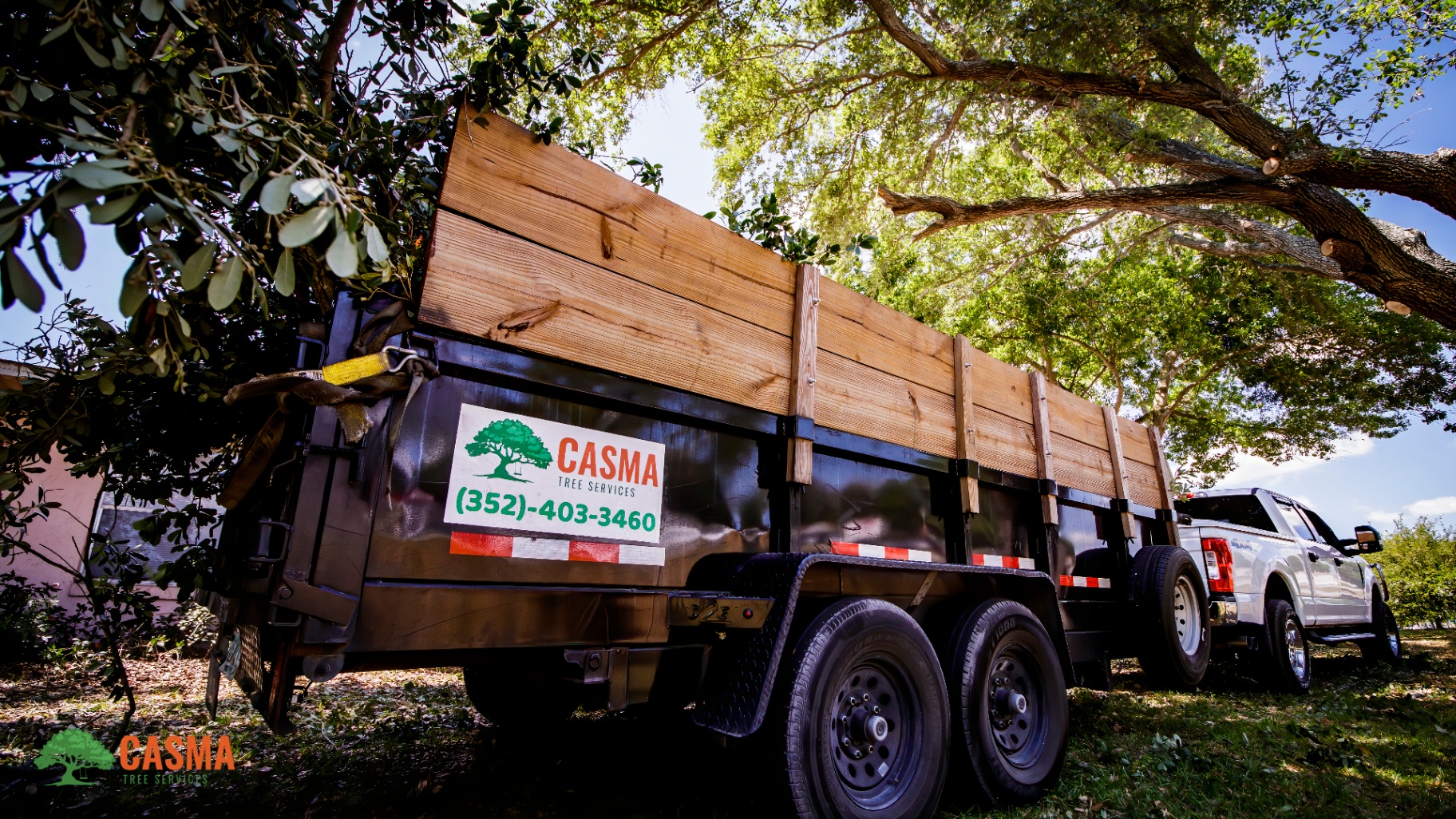 Casma Tree dump trailer and truck on a Polk County job site
